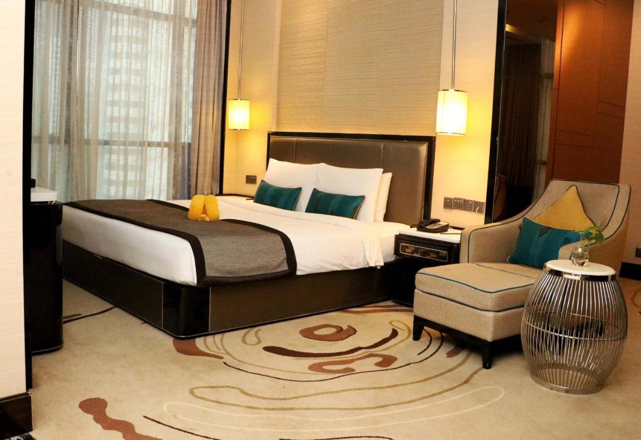 Pacific Regency Hotel Suites Kuala Lumpur Kültér fotó A bedroom at the hotel
