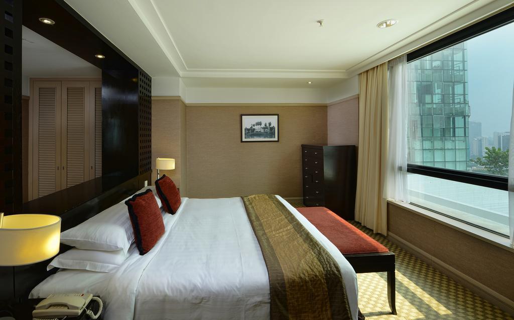Pacific Regency Hotel Suites Kuala Lumpur Kültér fotó A bedroom in the hotel